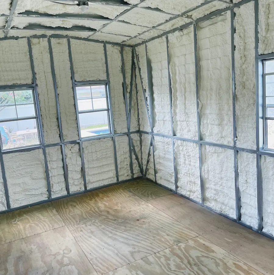 Closed-cell spray foam insulation applied to wall cavities in a residential project in East Point